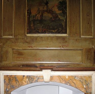 The "ghost" outline of the Marmion looking glass which leads conservators to believe it was original to the room. 