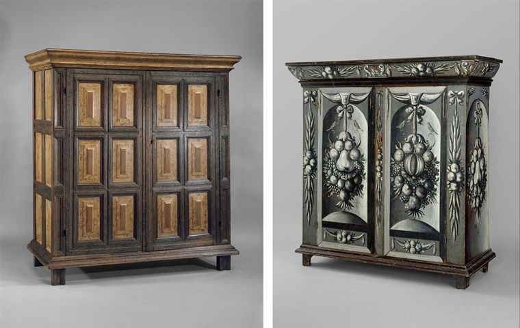 Left: Large wooden cupboard with carved geometric detailing. Right: Large wooden cupboard with black-and-white painted decorations of flowers and fruit. 