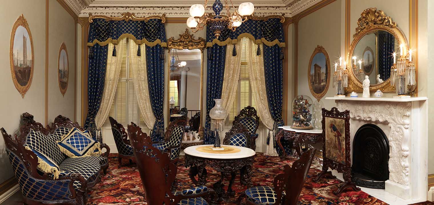 A cropped view of the Rococo Revival Parlor as installed in the American Wing at the Metropolitan Museum of Art.