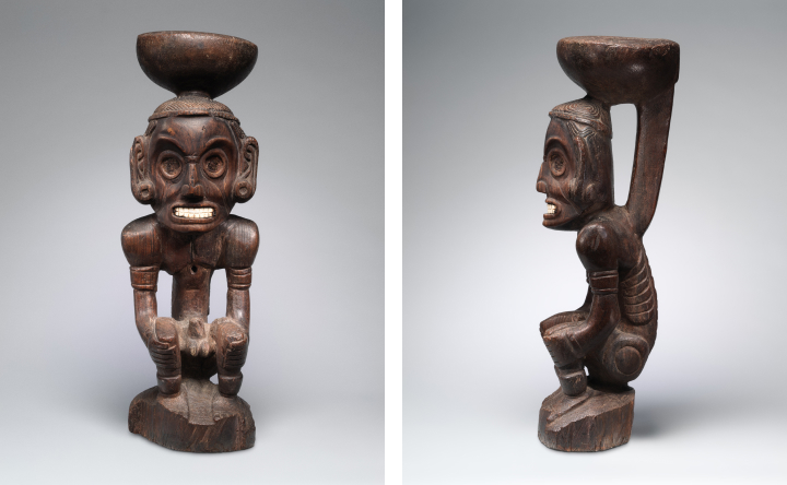 Wooden sculpture of a zemí figure.