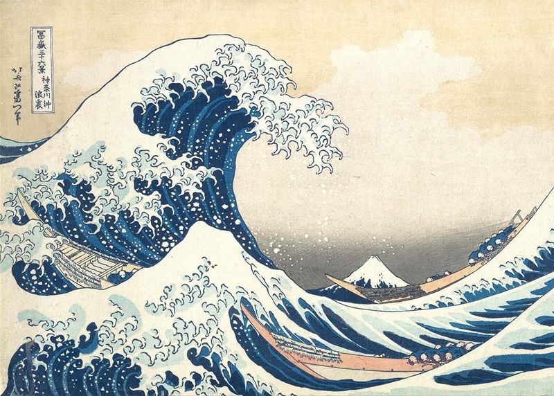 A print of a large wave dwarfing a boat